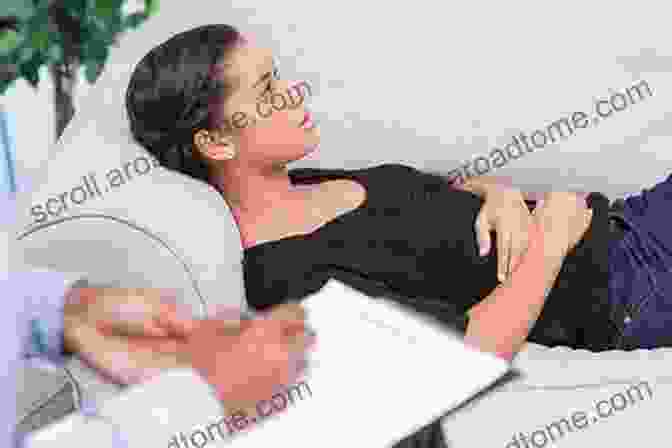 A Hypnotized Client Lying On A Couch, With A Therapist Standing Nearby. Past Life Regression: A Manual For Hypnotherapists To Conduct Effective Past Life Regression Sessions