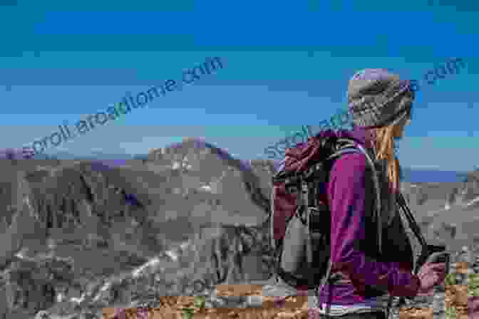 A Woman Hiking In The Mountains Joy : Photographs Of Life S Happiest Moments