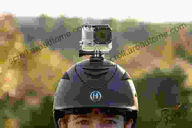 Action Camera Mounted On A Helmet, Capturing The Rider's Point Of View While Mountain Biking Through A Forest The Action Camera Handbook: Getting The Most From Your Action Camera