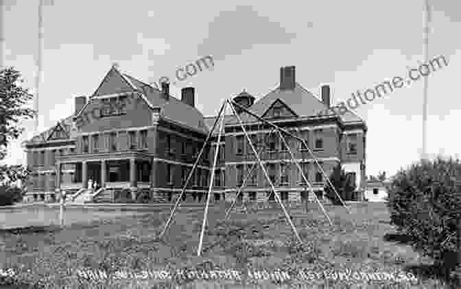 Exterior Of The Canton Asylum For Insane Indians, A Weathered Brick Building With Barred Windows And A Foreboding Atmosphere Vanished In Hiawatha: The Story Of The Canton Asylum For Insane Indians